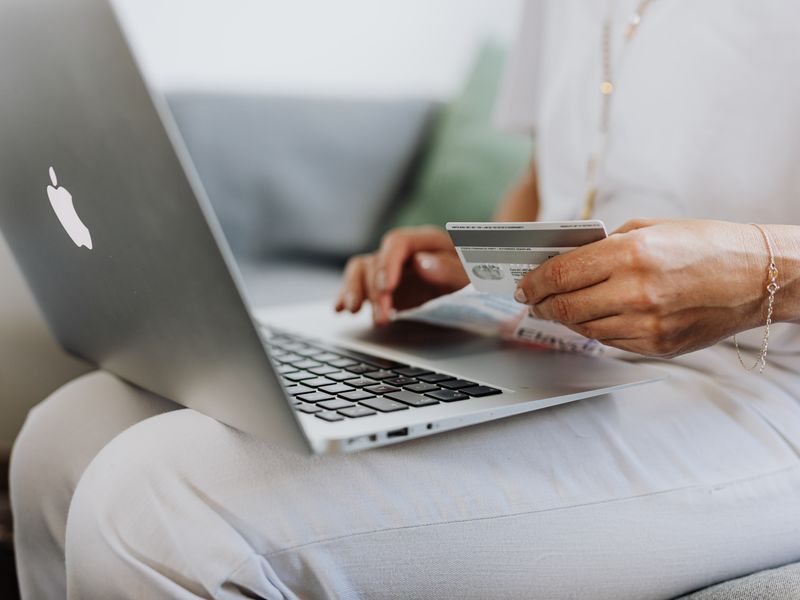 Financial analyst reviewing portfolio data on screen